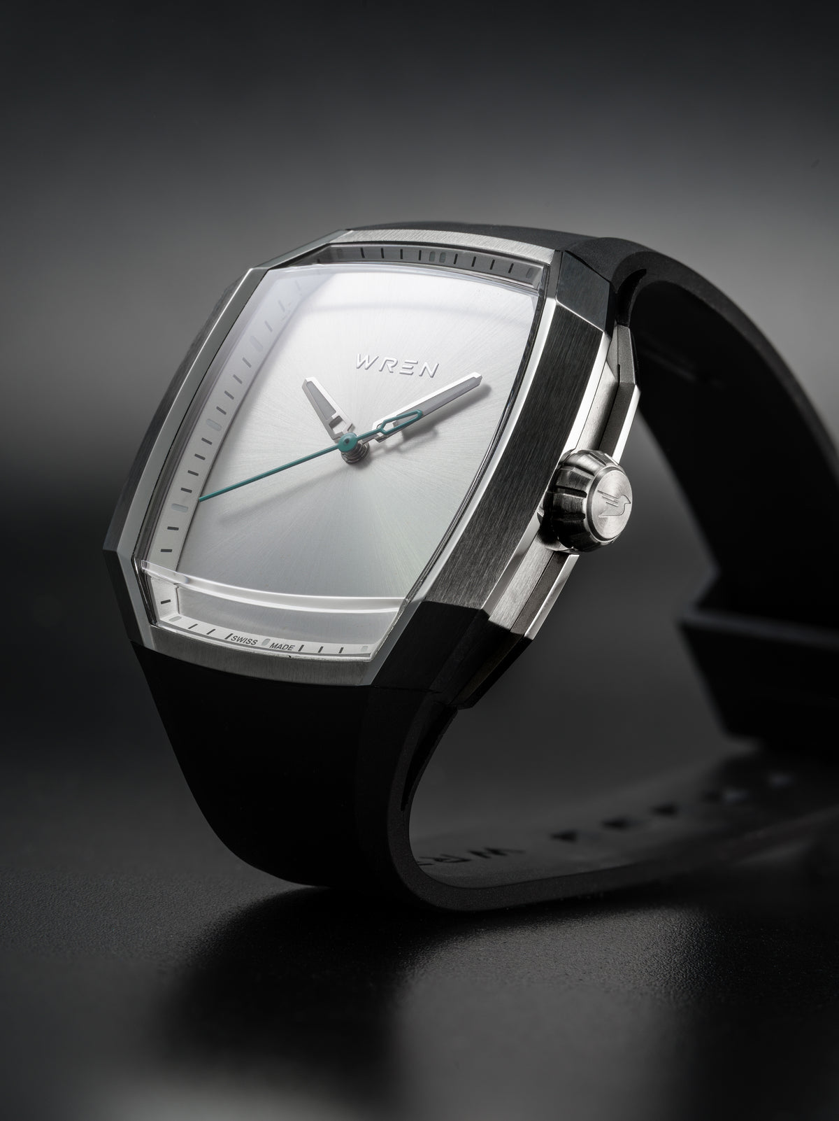 Macro side view of Vessel Sunray on black rubber strap with a faceted curved sapphire crystal